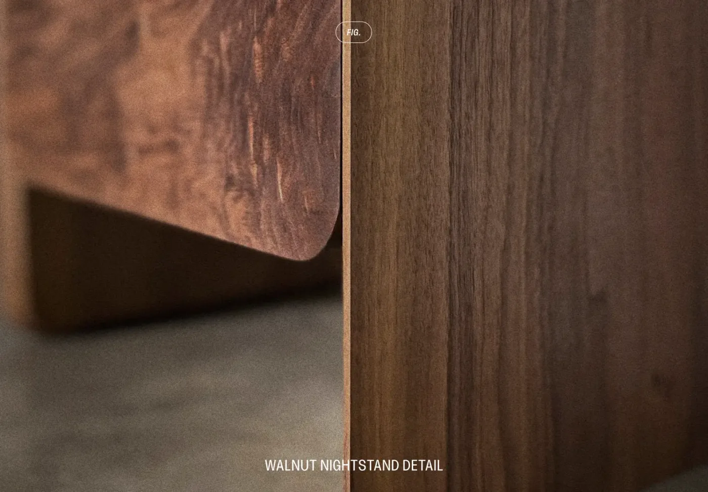 Close-up of a walnut nightstand: a door of figured walnut with a curved lower edge, beside a side of straight-grained walnut.